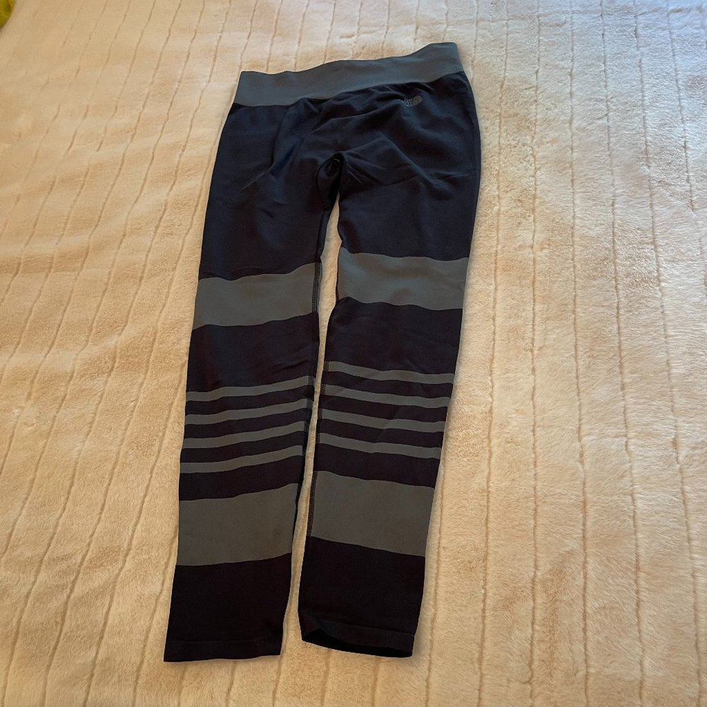 North Face athletic leggings in black spandex with grey stripes